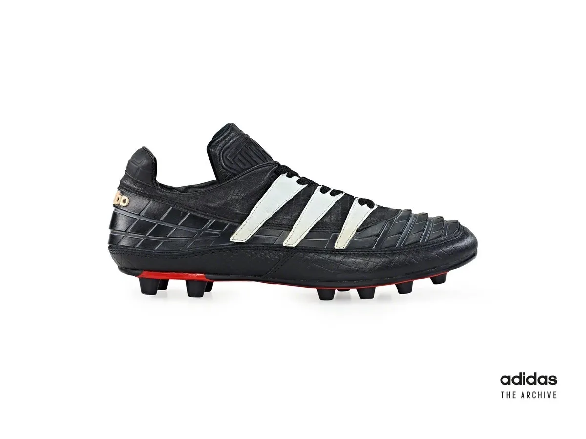 The original 1994 adidas Predator in black with white Three Stripes and the ridged rubber upper that started the line