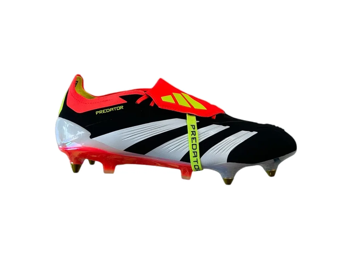 adidas Predator 24 Elite fold-over tongue soft-ground boot in the 2024 launch colourway: black upper, white Three Stripes, solar red tongue and yellow detailing