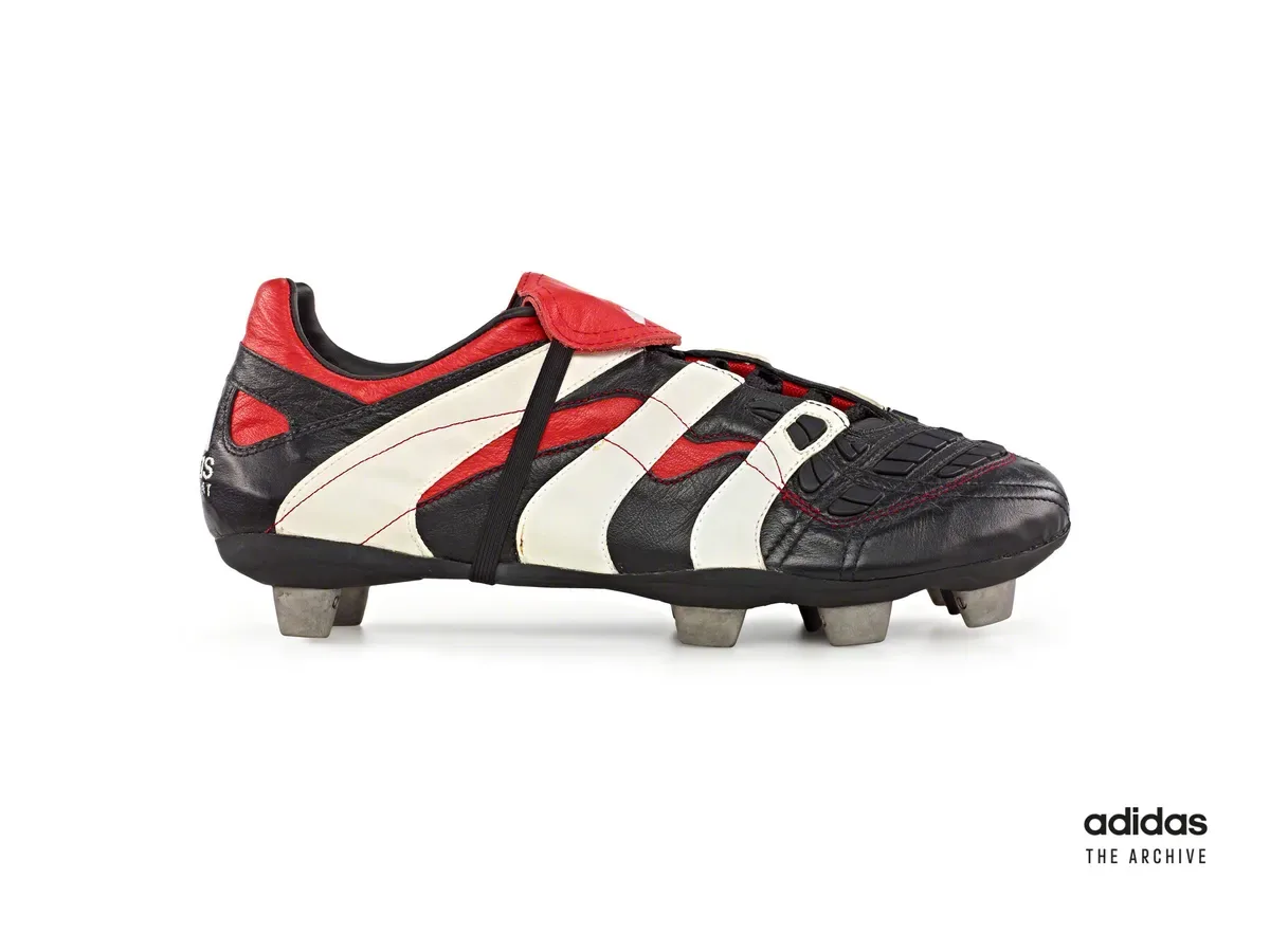 adidas Predator Accelerator from 1998 in black, white and red with sweeping curved Three Stripes