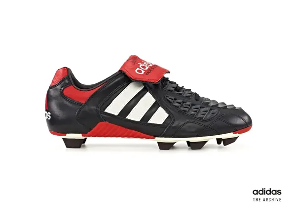 adidas Predator Touch from 1996 with red fold-over tongue and rubber ridges across the forefoot