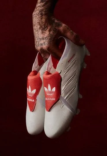 The 2026 Predator Precision remake in white with red fold-over tongue and BECKHAM branding