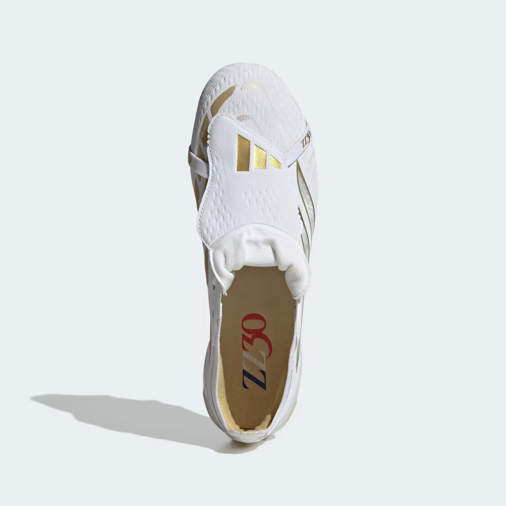 The ZZ30 sockliner, with “ZZ30” printed in red and navy on a gold insole